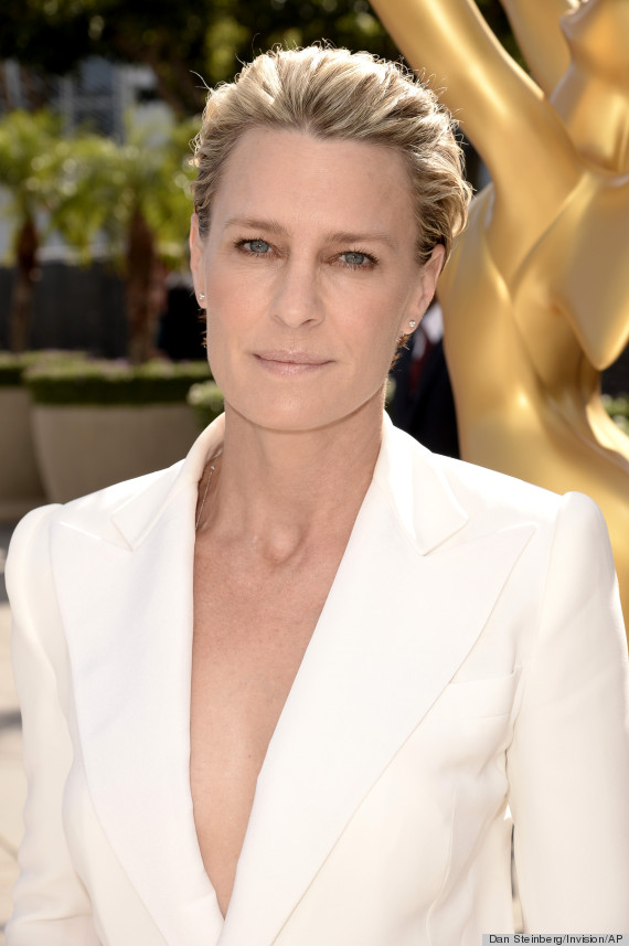 Robin Wright arrives at the 66th Primetime Emmy Awards at the Nokia Theatre L.A. Live on Monday, Aug. 25, 2014, in Los Angeles. (Photo by Dan Steinberg/Invision for the Television Academy/AP Images)